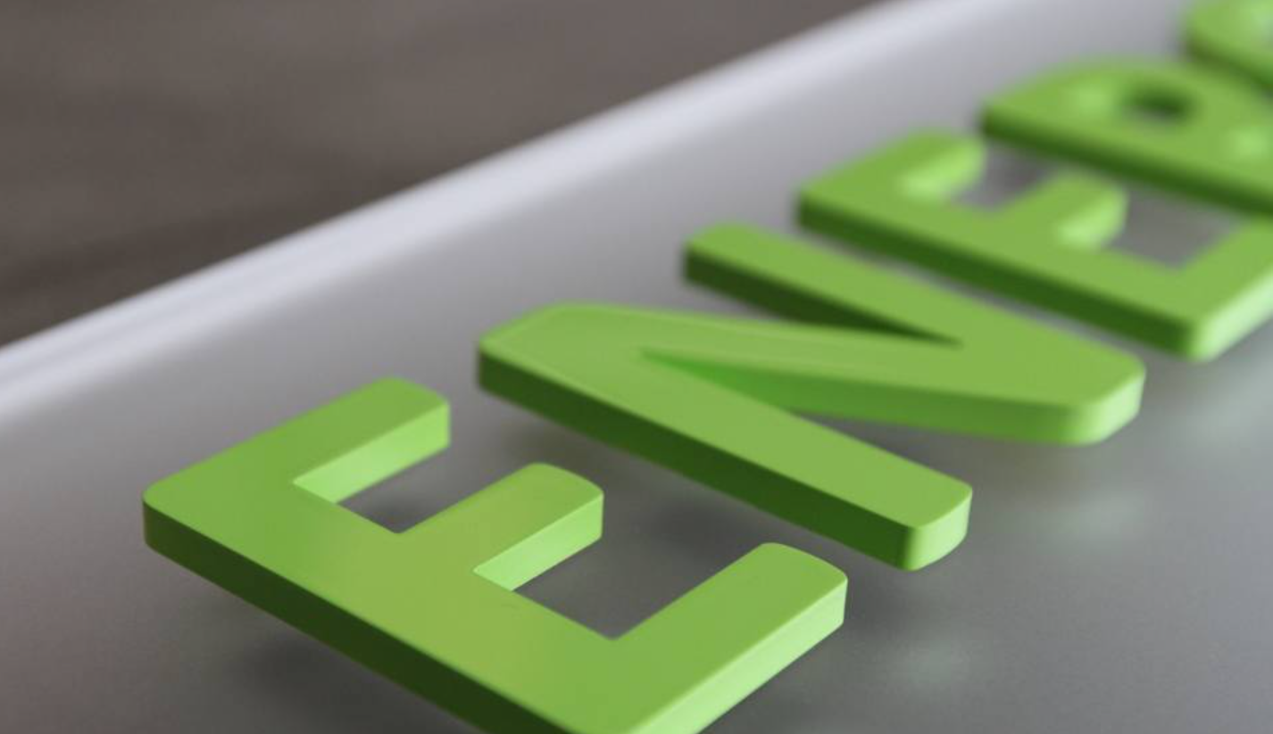 Close-up view of precision laser-cut acrylic signage edge finishing