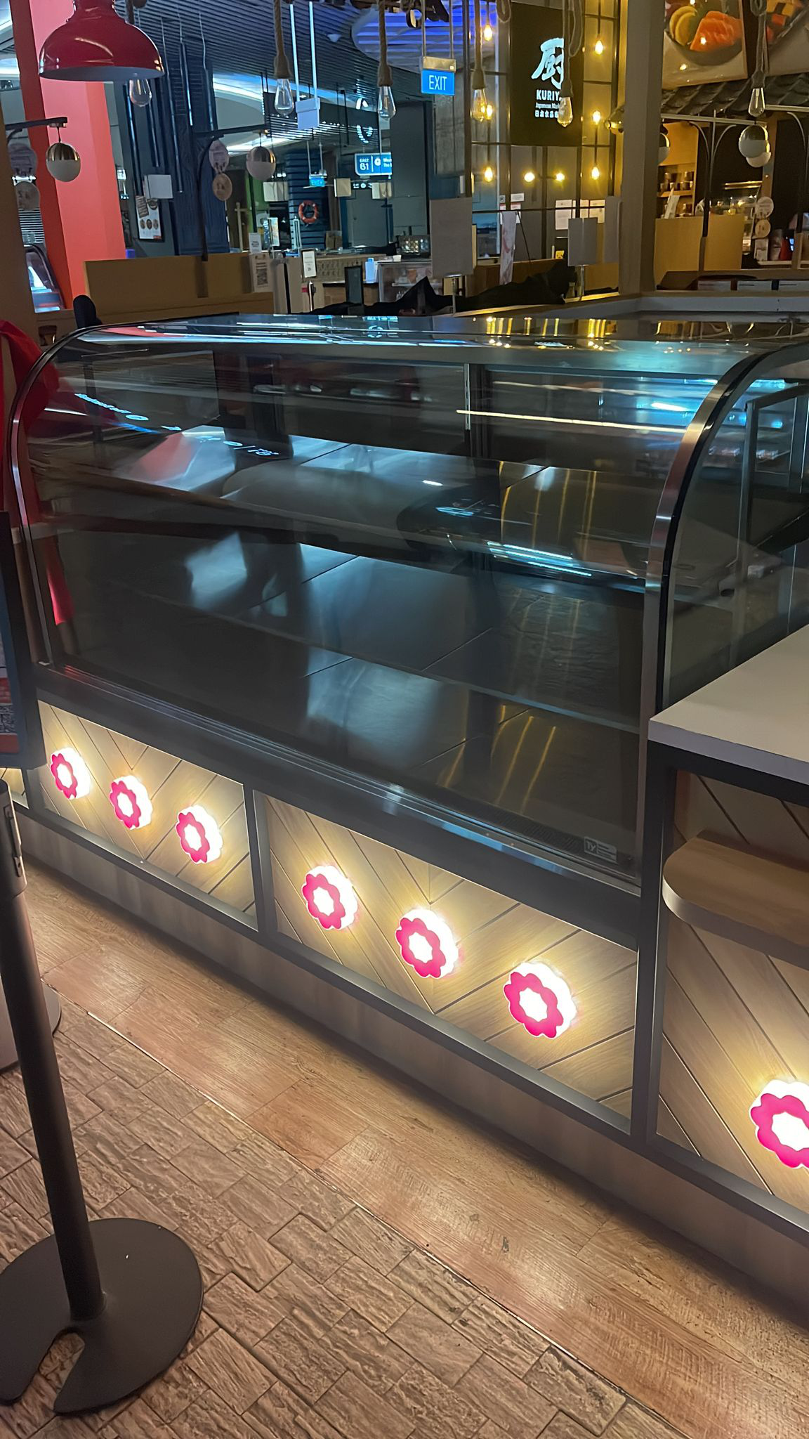 Mini donut shaped acrylic channel letters for BoxUp retail signage