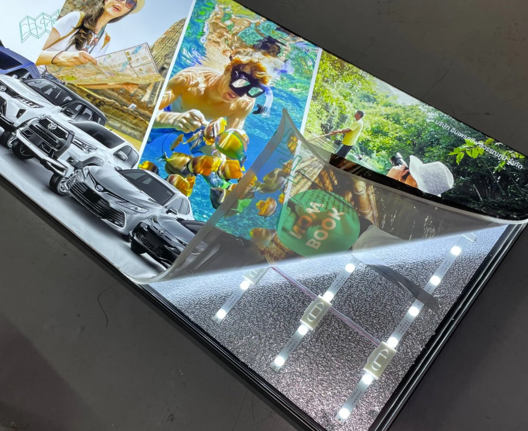 Interior fabric lightbox installation showing even LED backlighting