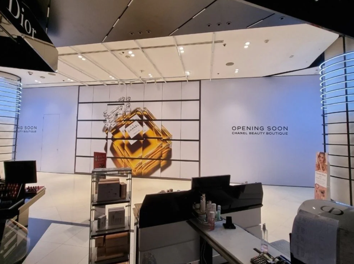 Chanel luxury brand hoarding stickers for retail construction site branding