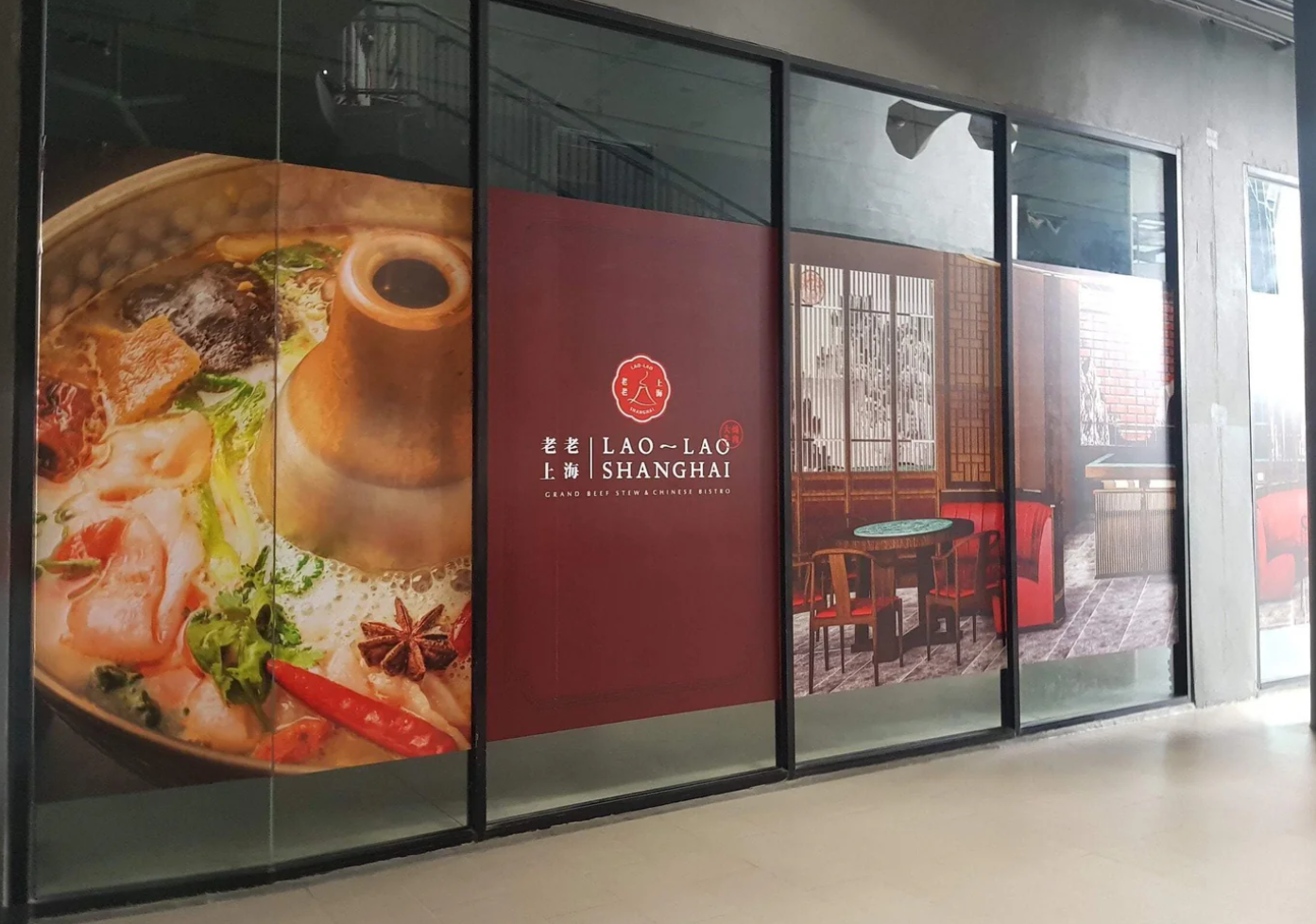 Large format hoarding stickers applied on glass surface for storefront