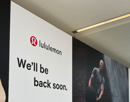 Lululemon athletic wear hoarding stickers for construction site marketing