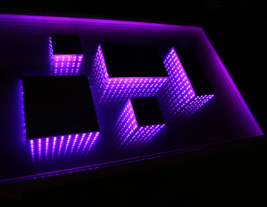 Glowing box infinity mirror installation with programmable LED effects