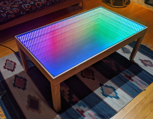 Infinity mirror table structure for restaurant ambient lighting feature