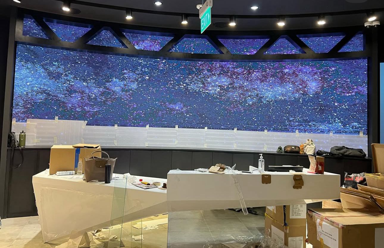 Large LED video wall display installation for retail counter advertising