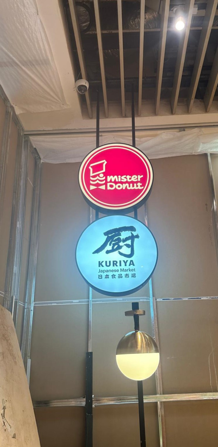 Blade lightbox signage for storefront wayfinding and brand identification